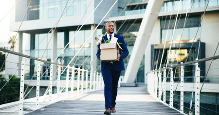Happy, black man or leaving business with box for new career, job opportunity or migration in city....