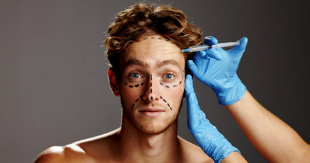 Beauty, plastic surgery and injection on face of man in studio for prp, aesthetics and collagen....