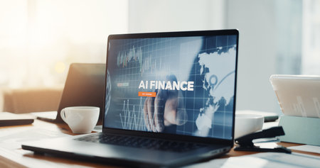 Empty office, laptop and screen for ai, finance and research with futuristic solution for fintech. Display, computer and workplace with artificial intelligence for global banking system at agencyの写真素材