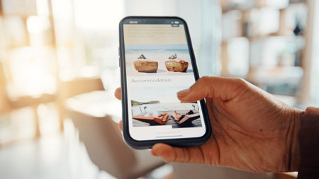 Person, hands and website with phone screen for accommodation, holiday or vacation trip. Closeup,...