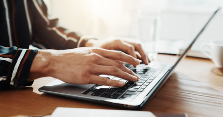 Typing, hands and business person on laptop for finance report, online proposal and research....