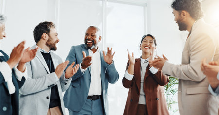 Clapping hands, teamwork and business people in office for good news, achievement or goal. Happy,...