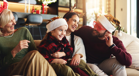 Grandparents, parents and child in home for Christmas, festive season and bonding on holiday. Happy...