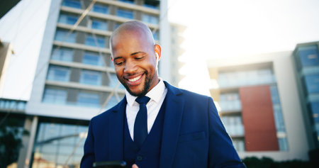 Happy, phone and black businessman in city for text, networking and online message. Corporate,...