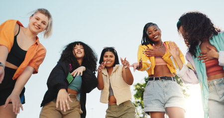 Portrait, people and dancing crew in city with music, hip hop culture and freestyle choreography. Smile, group and friends breakdance with energy, rhythm and performance with streetwear at urban parkの写真素材