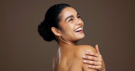Laughing, woman and skincare for bodycare, glow and smooth skin with cosmetics, thinking and mockup....