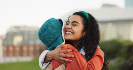 Happy, woman and hug with friends outdoor for love, care and bonding together with affection. Smile,...