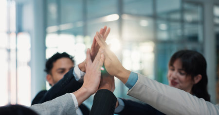 Hands, high five and business people celebrate teamwork, corporate support or collaboration. Together, solidarity gesture or group of workers with cooperation for goal, motivation or target in officeの写真素材