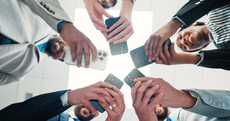 Research, colleagues and group with smartphone, office and networking for project on website or app....