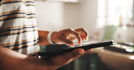 Tablet, hands and person scroll in home for renovation, online shopping and remodeling. Technology,...