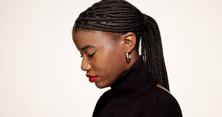 Red lipstick, cosmetics and profile of black woman in studio with beauty, makeover and self care....