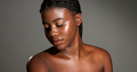 Skincare, glow and African woman in studio for body care, satisfaction and spa wellness. Space, gray...