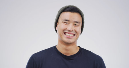 Happy, confident and portrait of man in studio with positive attitude for university scholarship....