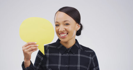 Portrait, woman and icon with speech bubble in studio for announcement, news and signage. Mockup...