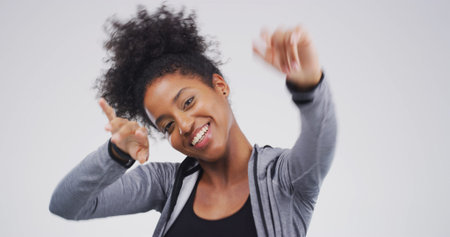 Portrait, African woman and dance in studio for good news, lottery winner and celebration. Person,...