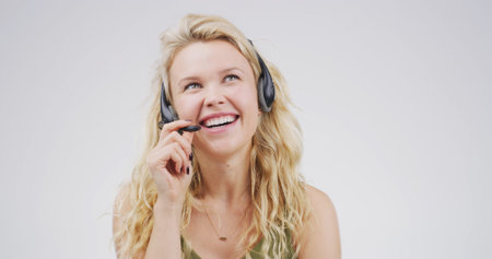 Woman, laugh and headset at call centre in studio for consultation, funny client and contact us....