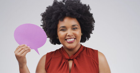 Happy, black woman and portrait with speech bubble for social media on a white studio background....