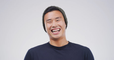 Laughing, happy and portrait of man in studio with mockup space for comedy joke with humor. Goofy,...