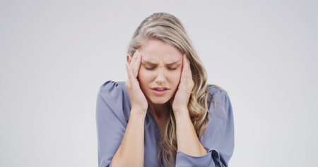 Thinking, employee and woman with headache, stress or overwhelmed with workload, studio and anxiety....