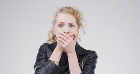 Terror, shocked and portrait of woman in studio with omg, wtf or wow reaction for news. Emotion,...