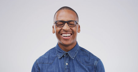 Laughing, glasses and business black man in studio for it support, entrepreneur or pride. Startup,...