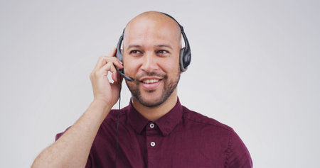 Call center, man and talking on microphone in studio for lead generation, product knowledge or CRM....