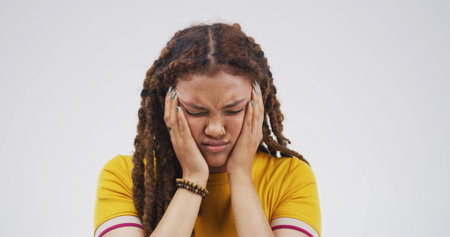 Student, sad and face of woman in studio with upset reaction, emotional and worry for results....