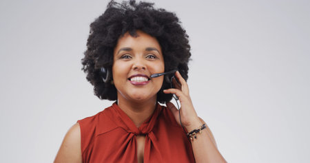 Portrait, call centre and black woman in studio, smile or online consultation on white background....