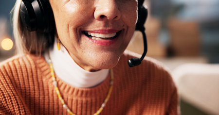 Mature woman, consultant and headset with mic for online communication or customer service in home....