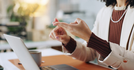 Hands, counting and business person with laptop for budget, accounting or tax calculation in office. Woman, asset management and technology for finance, profit or review for payment or online bankingの写真素材