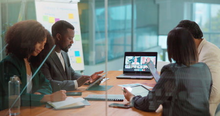 Laptop screen, tablet and video call with employee people in boardroom for online planning. App, computer and virtual meeting with business team in office for communication or development webinarの写真素材