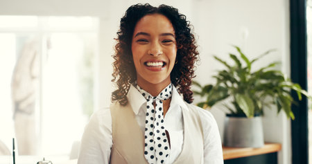 Hospitality, portrait and woman at hotel reception for customer service, welcome or luxury accommodation. Smile, friendly concierge and happy in lobby for check in assistance, help or travel bookingの写真素材