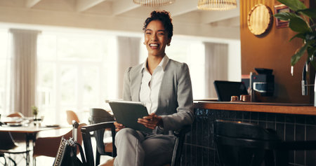 Happy woman, portrait or travel with tablet in hotel for online booking, accommodation or check in. Female person, customer and corporate traveler with smile on technology for commute or stay in cafeの写真素材