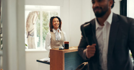 Concierge, smile and help desk with woman in hotel for check in assistance, reservation and booking....