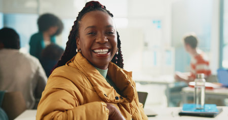 Portrait, students and woman in class, college and smile with learning, creativity and development. People, group and scholarship with growth, academy and knowledge with education and universityの写真素材