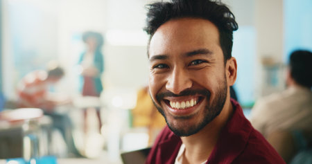 Portrait, student and man in classroom, education or confident for knowledge in university or learn. Happy, pupil and person with scholarship for course, pride and smile for lesson in college and USAの写真素材