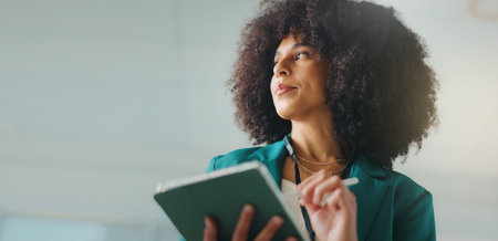 Tablet, business woman and graphic designer thinking for idea, inspiration or insight and low angle. Planning, tech and artist with stylus for drawing, research or work on project at creative startupの写真素材