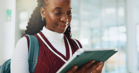 University, student and black woman with tablet, online reading and email with study schedule. College, education or African person with tech, internet and digital app for elearning and social mediaの写真素材