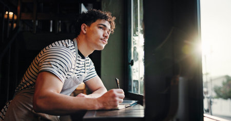 Thinking, barista and man writing notes in cafe for inventory list, stock or planning menu....