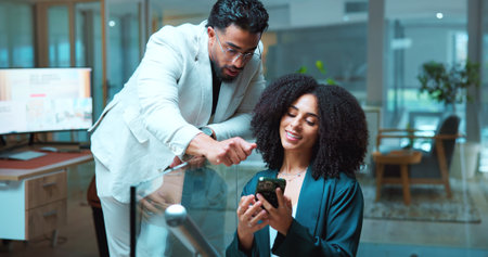 Business people, phone and team in office for planning, financial report and review budget. Talk, discussion and digital tech on stairs for teamwork, finance feedback and information for investmentの写真素材