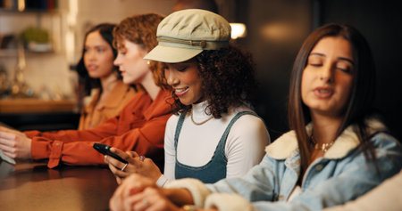 Women, friends and night with phone for social event, get together or evening out in restaurant....