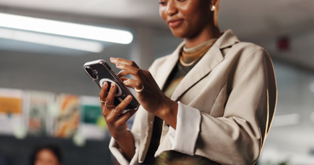Hands, phone and scroll with business black woman for social media manager, communication and research. Online branding, networking and marketing campaign with person in creative agency for webの写真素材