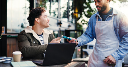 Pos machine, employee and man with smartphone, ecommerce and purchase with wireless transaction. Cafe, customer and waiter with online service, cellphone and fintech with payment and digital appの写真素材