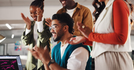 Excited business people, applause and smile in promotion, announcement or success in office. Group of employees, clapping hands and celebration for partnership, prize or workplace funding approvalの写真素材