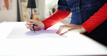 Hands, artist and drawing with paper at studio, creativity and lines for artwork on board in home....