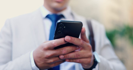 Hands, phone and business person outdoor for email, text or message for finance update. Mobile, man...