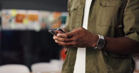 Office, employee and hands with phone, social media or texting with contact on app or communication....