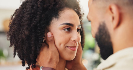 Love, connection and couple with romance in home for affection, assurance and bonding together. Happy, people and loyalty in marriage with protection, commitment and healthy relationship in apartmentの写真素材