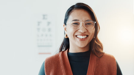 Smile, woman and glasses for vision, eye care and portrait for optometry with health in clinic. Prescription lens, frame choice and healthcare, eyewear and exam with wellness and medical serviceの写真素材