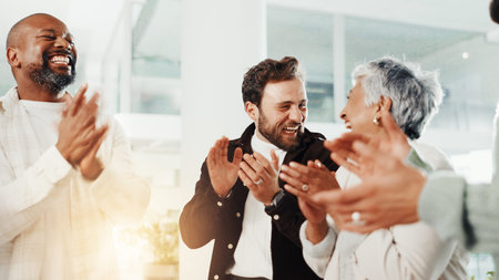 Flare, applause and happy business people in office to celebrate achievement, victory and success. Corporate, clapping hands and workers for teamwork, collaboration and good news for company profitの写真素材
